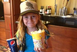 Young girl holding concessions